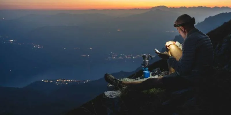 Hiking gear including boots, backpack, and outdoor clothing for trail preparation